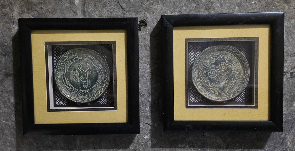 2 Aztec or Mayan style clay plate framed in shadow boxes
